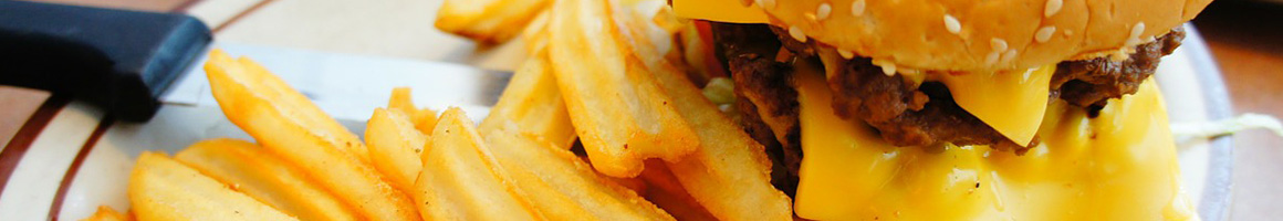 Eating American (New) Burger Hot Dog at Freddy's Frozen Custard & Steakburgers restaurant in Chubbuck, ID.